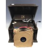 A 'His Master's Voice' gramophone together with records
