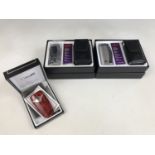 Three boxed Colibri lighters, including Quantum QTR721004, and Quantum Enterprise (2)