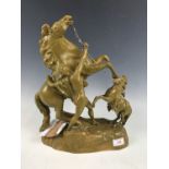A gold-painted horse figurine