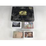 A quantity of Star Wars collectors' / trading card packs, including a 1977 collection etc