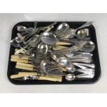 A quantity of electroplate cutlery including a bone-handed set and ladles etc