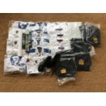 A large quantity of Malcolm Wilson motorsport clothing and promotional material