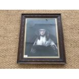 A 19th Century offset-lithographic portrait of a nun, framed and mounted under glass, 47 x 36 cm