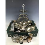A large quantity of electroplate silver including tureens, baskets, trays and a pair of cockerels