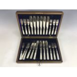 A canteen of antique mother-of-pearl handled electroplate fish cutlery