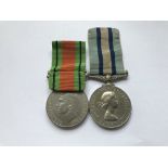A Second World War Defense Medal and QEII Observer Corps Medal