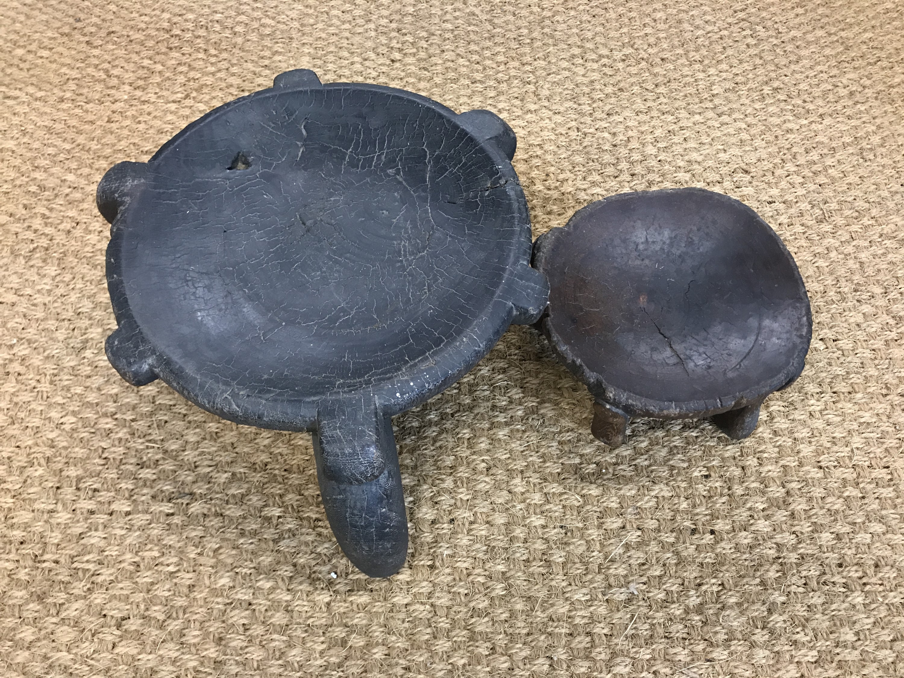 Two antique African carved wooden stools