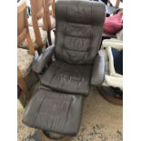 A Stressless type brown recliner chair with footstool