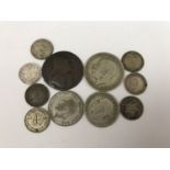 A 1792 John Wilkinson, Iron Master copper token together with a small quantity of GB silver coins