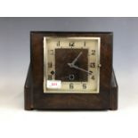 An Art Deco mahogany cased mantel clock, having a Norland movement with Westminster chime