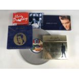 A quantity of Elvis Presley singles, EP's, CD's and DVD's etc