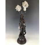 A cast-metal figural table lamp, 86 cm high