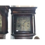 A George III oak long case clock by Sutton of Stafford, having 30-hour movement and square brass