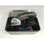 A cased Bosch XEO cordless universal cutter