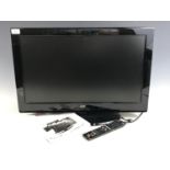 A Logic TV with built in DVD player and remote control