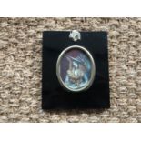 A portrait miniature of a lady in 18th Century dress, watercolour, framed under glass, 7.5 x 6 cm