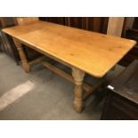 A quality reproduction pine refectory table, 182 x 76 x 78 cm