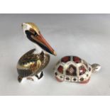 A Royal Crown Derby Brown Pelican paperweight together with a Royal Crown Derby tortoise