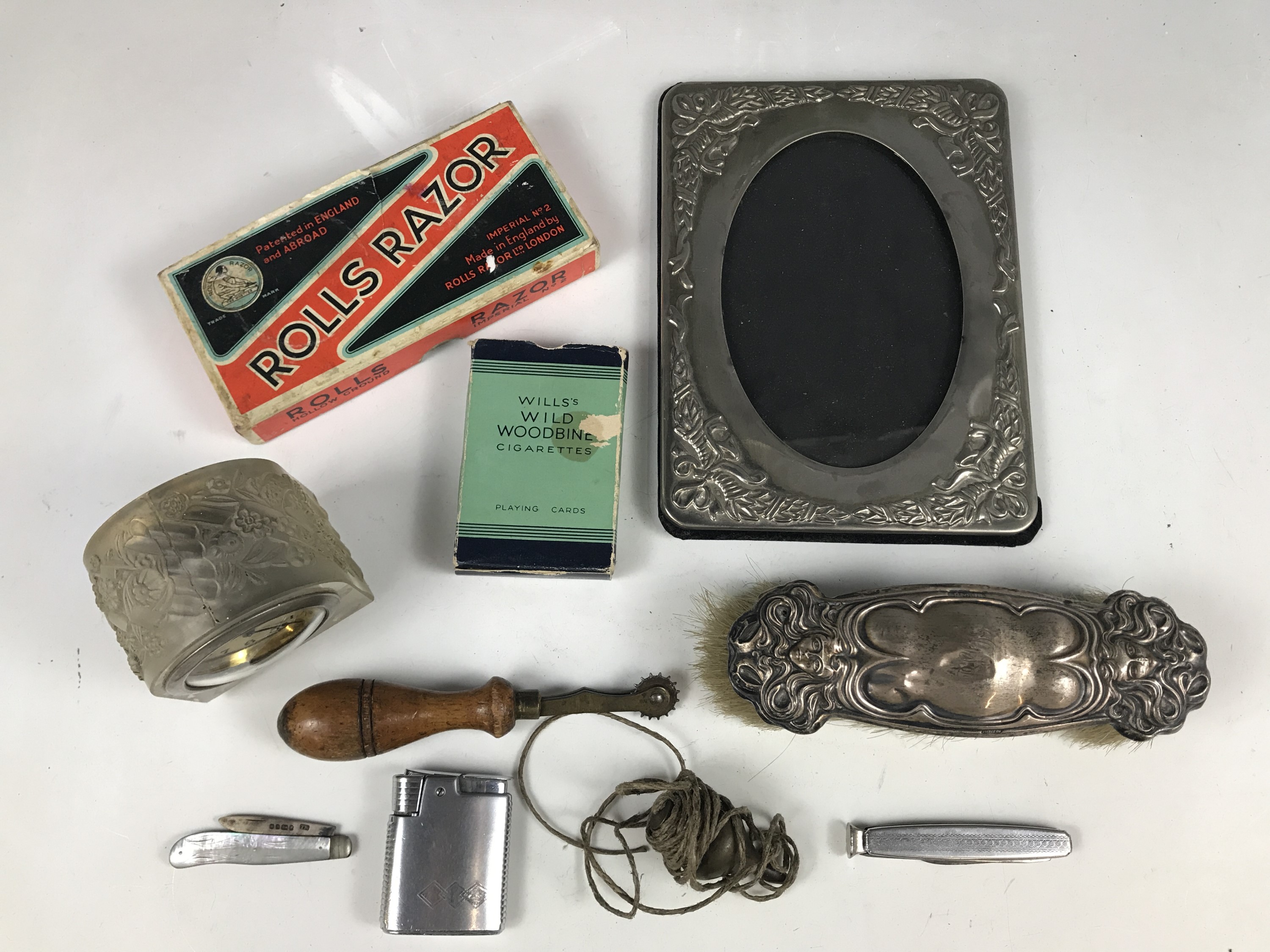 Sundry collectors' items including a silver fruit knife, a silver mounted clothes brush, a boxed