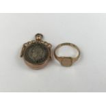 A 9ct gold signet ring, 1.6 g, together with a 9ct gold swivel fob, set with a silver threepence and