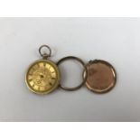 A Victorian lady's 9ct gold cased fob watch (a/f), 3 cm diameter, 4.2g case back and cover (