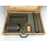 An inert post-War East German mine training set, in transit case