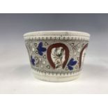 A Victorian Bo'ness Pottery porringer, transfer-printed and hand-tinted in the "Horse Shoe" pattern,