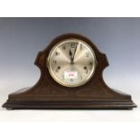 A Junghans mahogany cased mantel clock, having W200 movement with Westminster chime, in a string-