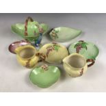 A small collection of Carlton Ware, including two foxglove jugs, a foxglove basket and sundry leaf