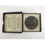 A Great War Lusitania medal and carton
