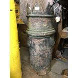An antique fire-clay chimney pot