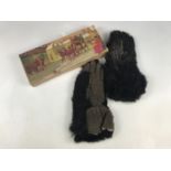 A pair of fur and suede leather flying / driving gloves