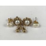 A pair of 9ct gold and pearl stud earrings, 4.3g, together with two other pairs of yellow metal /
