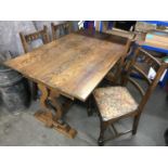 An Old Charm style oak refectory table together with four matching dining chairs