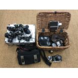 A quantity of cameras and lenses including a Nikon F-401S, a Nikkormat, a Nikomat, a Pentax Asahi