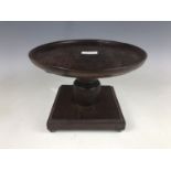 An 18th century and later mahogany lazy Susan