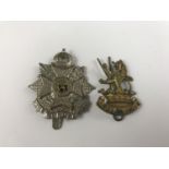 Border Regiment and Wellington Infantry Battalion cap badges