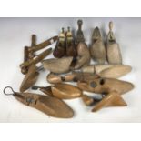 A quantity of vintage shoe lasts