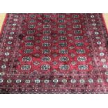 A contemporary Pakistan / Afghanistan 100% wool pile Bokhara design rug, 235 x 157 cm
