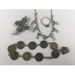 A silver coin bracelet and sundry items of vintage costume jewellery
