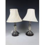 A pair of electroplate candlestick table lamps with shades