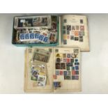 A Stanley Gibbons 'The Improved Postage Stamp Album' containing a collection of world stamps QV -