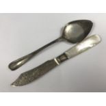 A silver preserve spoon and butter knife
