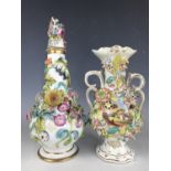 A 19th century floral encrusted lidded vase and one other