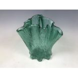 A green glass handkerchief vase