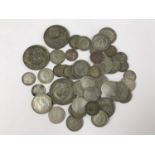 A small quantity of pre-1922 and pre-1947 GB silver coins, 168g