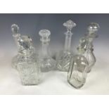 Six glass decanters including Prussian-bodied and shaft-and-globe examples etc