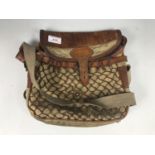 A hide-trimmed canvas game / fishing bag by Liddlesdale of Newcastleton