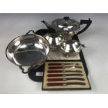 Electroplate including an Art Deco three-piece tea set, a basket, and a cased set of six butter