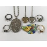 A silver and white-metal vintage jewellery, including a large oval locket on chain, 31g, one other